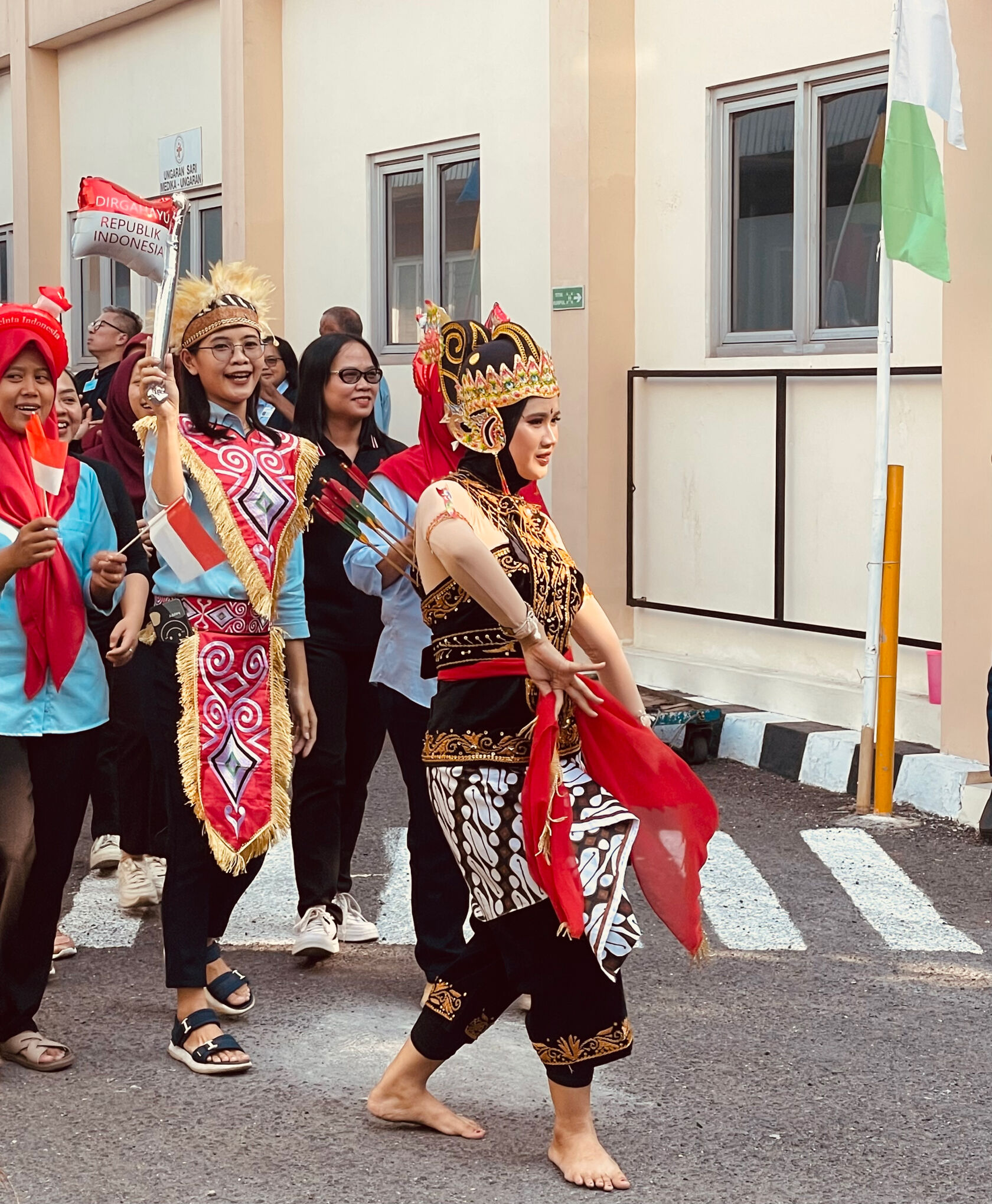Workers in costume celebrating Indonesian Independence. Workers in costume celebrating Indonesian Independence.