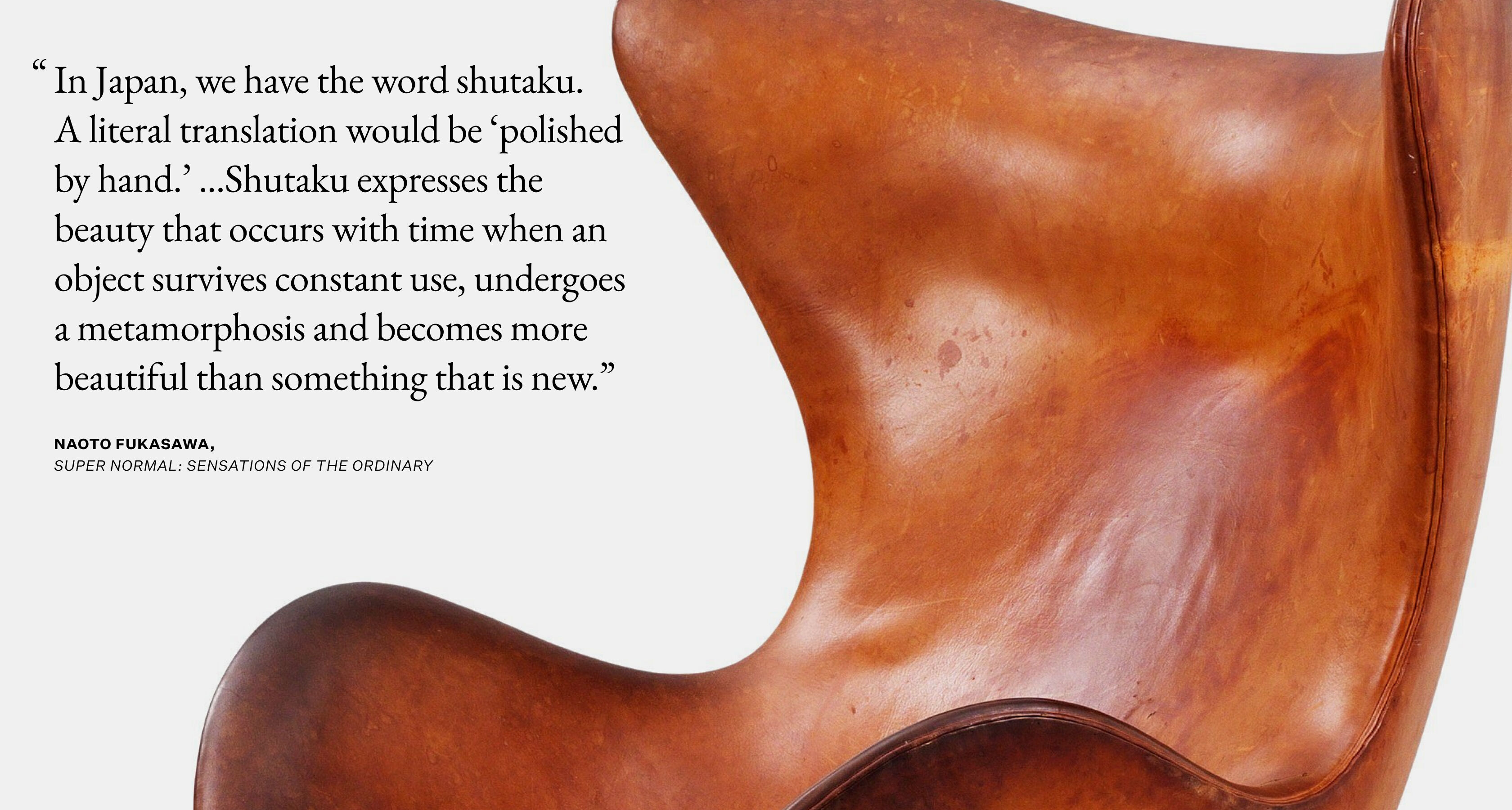 A leather chair with stains and patina. A leather chair with stains and patina.