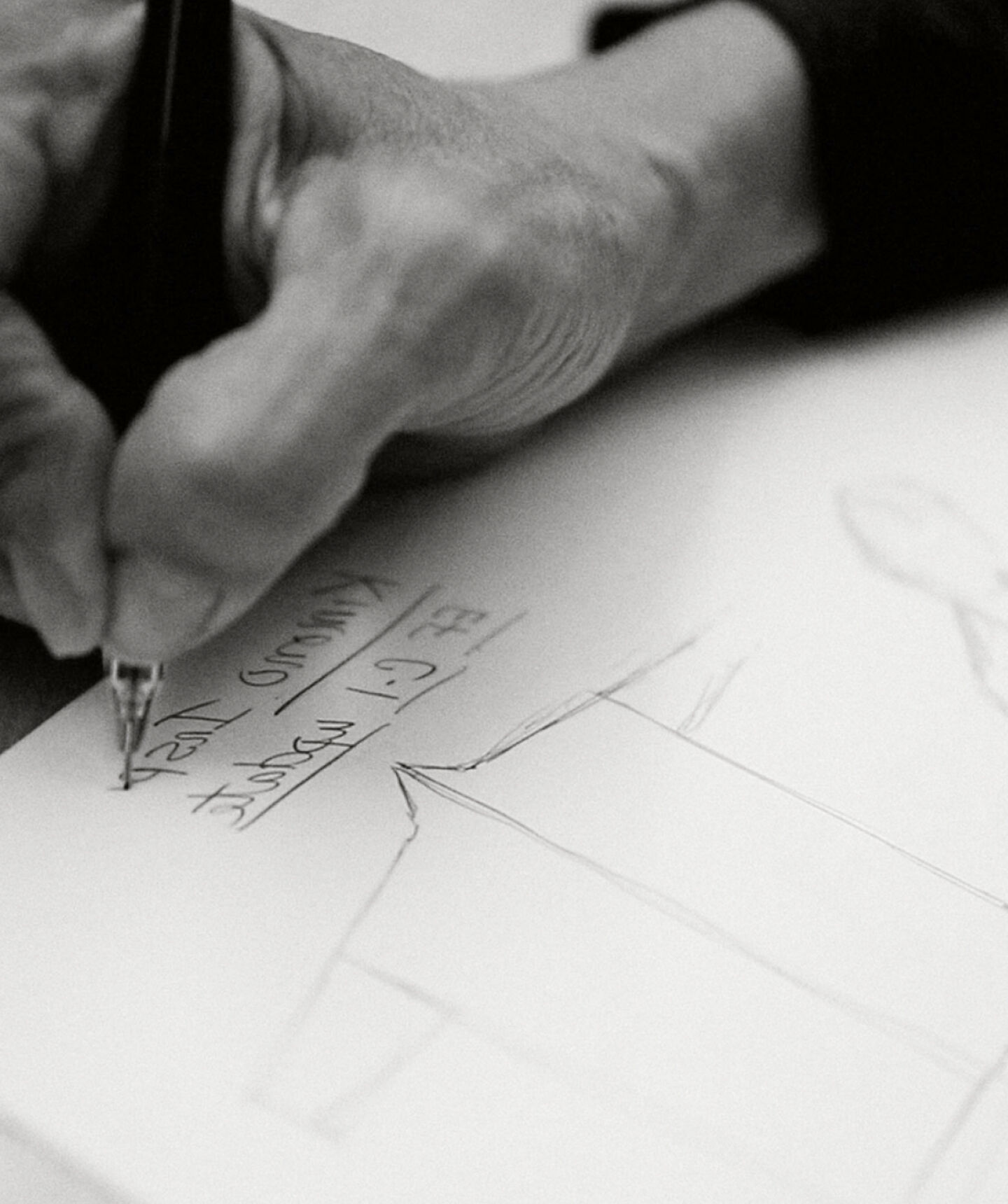 Designer drawing a shawl collar jacket. Designer drawing a shawl collar jacket.
