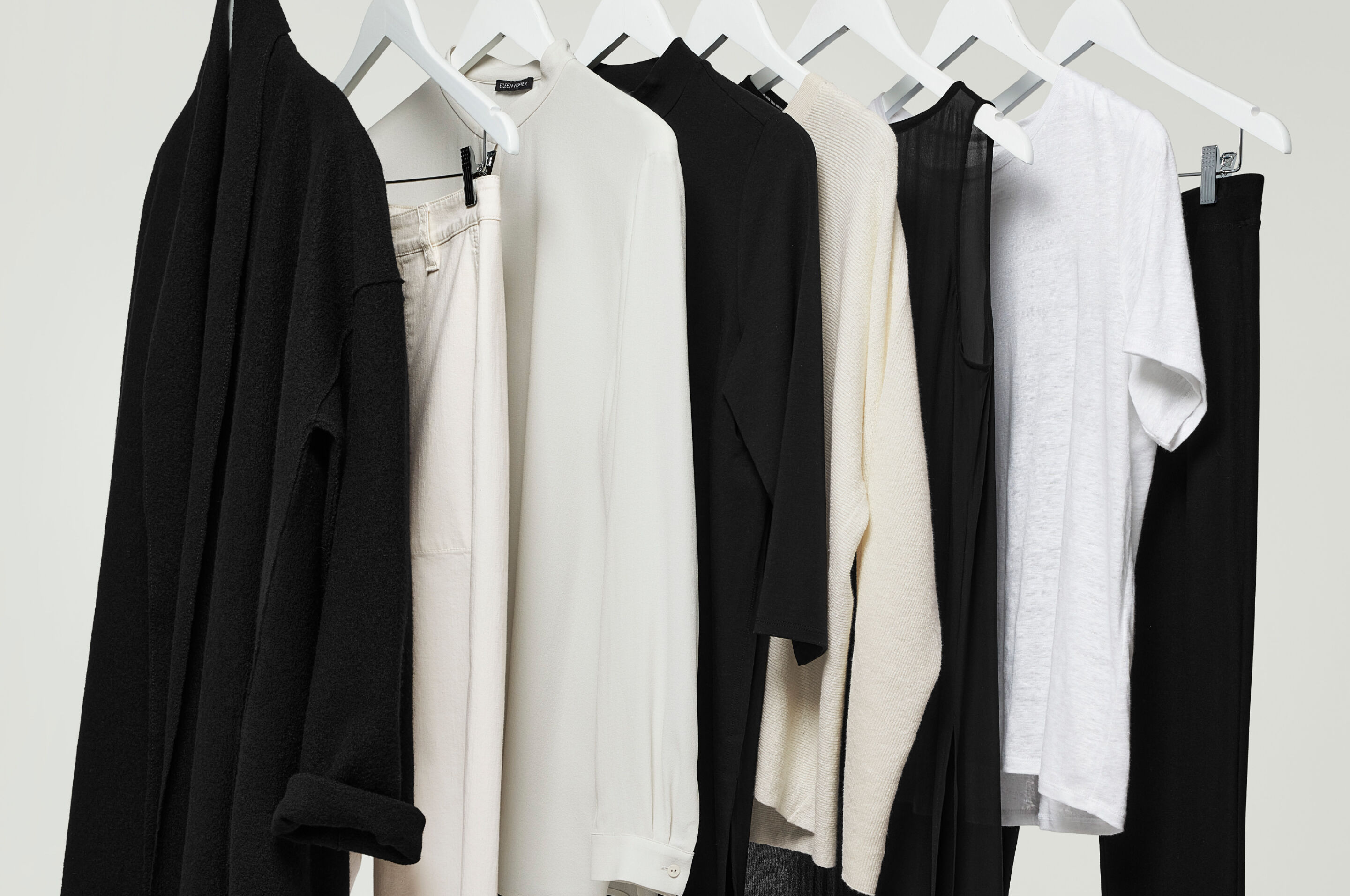 Rack of neutral women's clothing. Rack of neutral women's clothing.