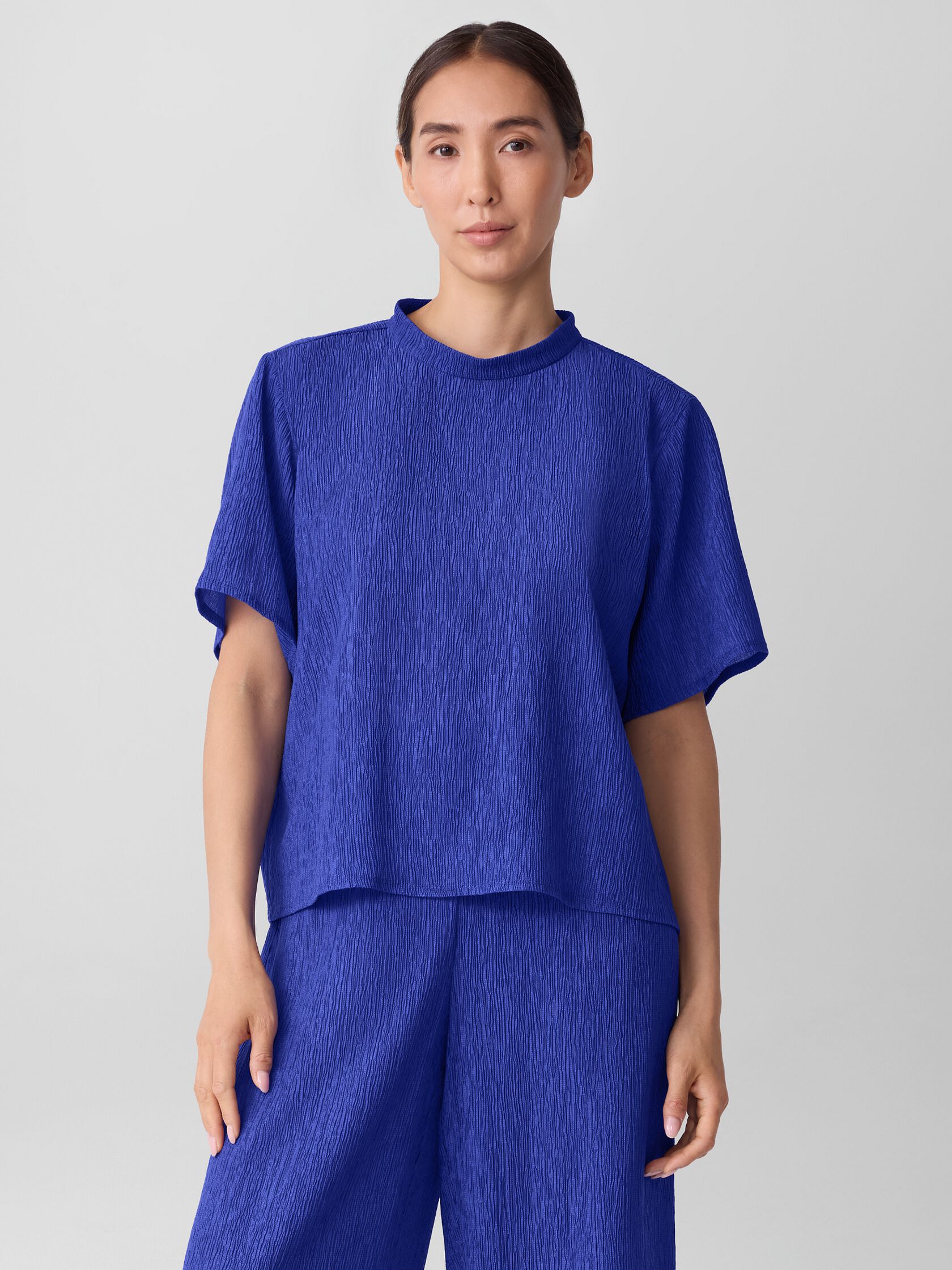 Woven Plissé Mock Neck Top